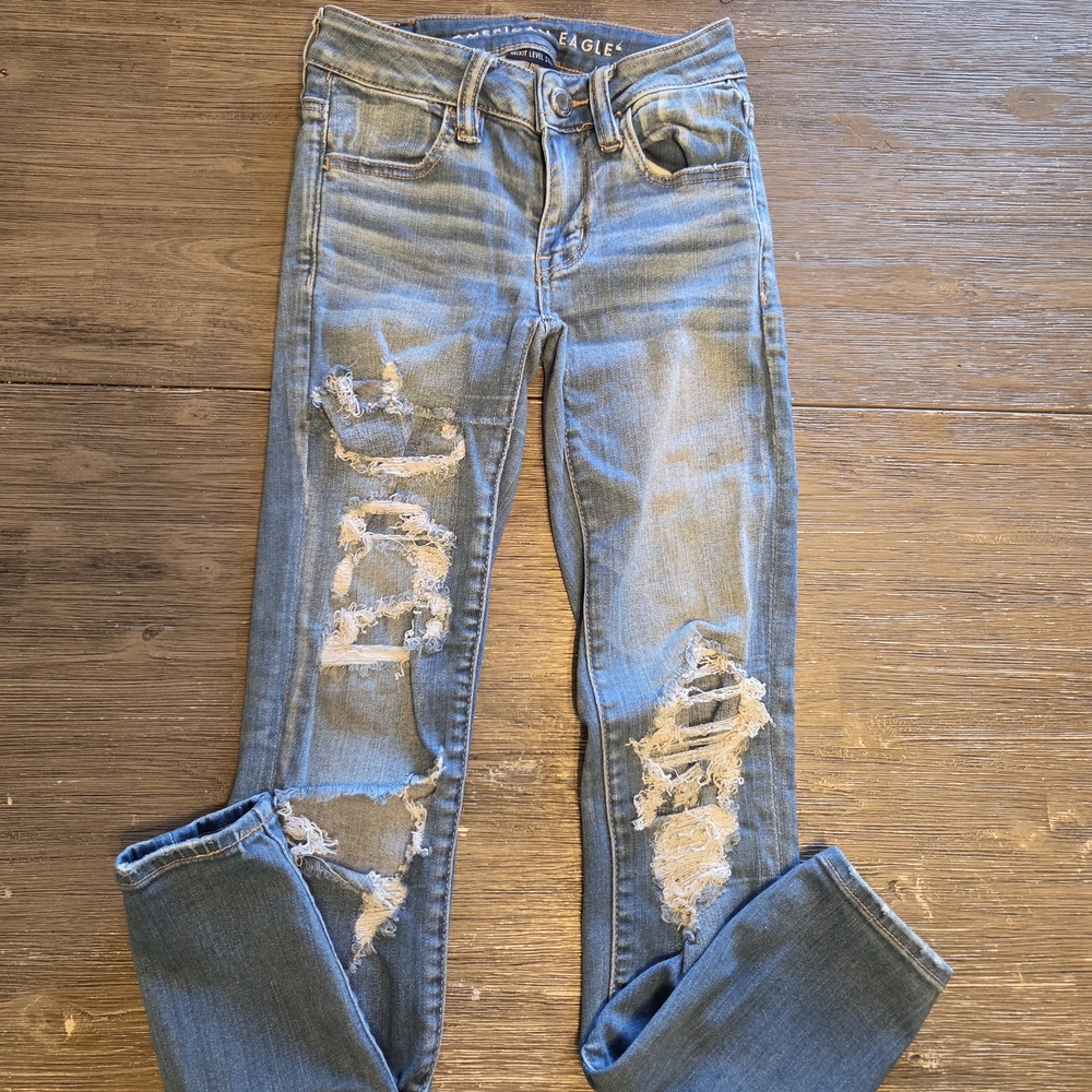 AE Women's Next Level Stretch Light Blue Distressed Jeggings